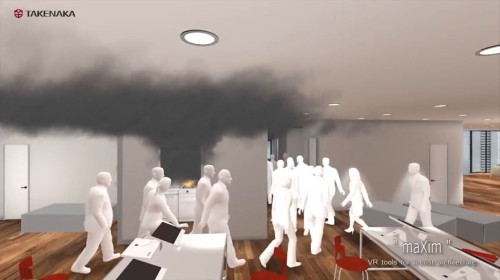給湯室で火災が発生する中、避難を始める社員